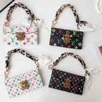 Lulu Monogram Leather Phone Bag with Handle & Crossbody Strap